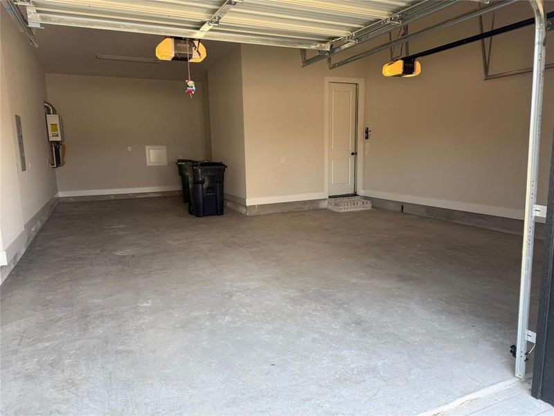 Garage featuring a garage door opener Garage featuring a garage door opener