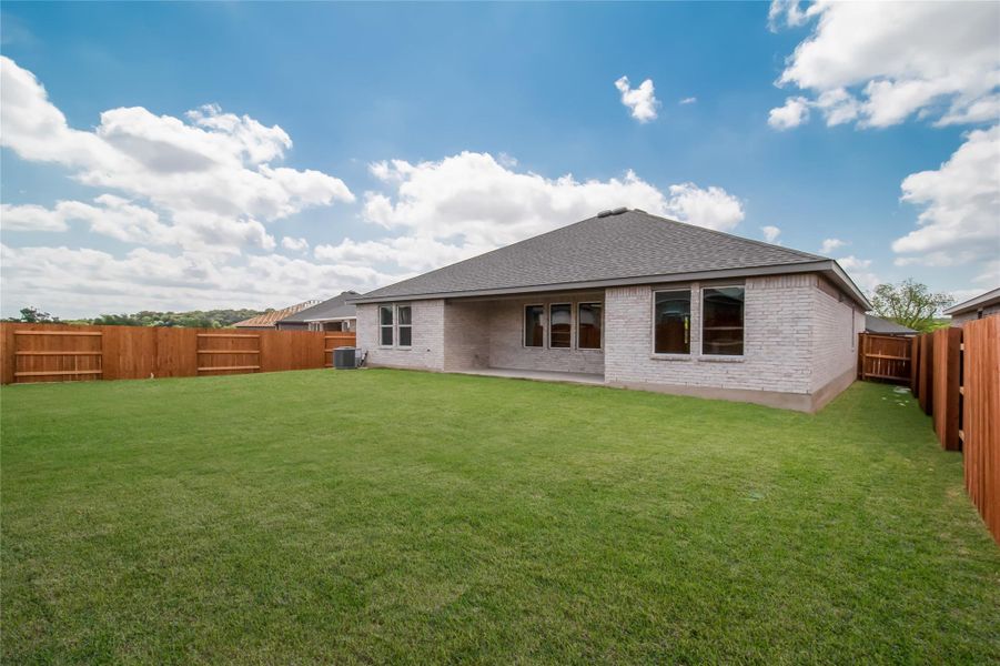 Front exterior of a new home in Riverview, Georgetown, TX, highlighting curb appeal (Image 12). Front exterior of a new home in Riverview, Georgetown, TX, highlighting curb appeal (Image 12).