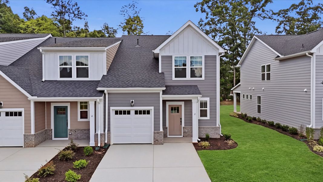 Front exterior of a new home in Pelham Crossing Villas, Greenville, SC, highlighting curb appeal (Image 23). Front exterior of a new home in Pelham Crossing Villas, Greenville, SC, highlighting curb appeal (Image 23).