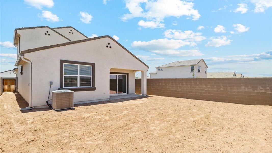 Exterior details and patio area of a home in Radiance at Superstition Vistas, Apache Junction (Image 22).