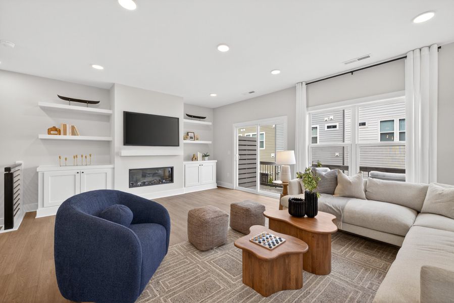 Representative furnished interior of a home built from the Cora End Unit by Baker Residential in Atwater Station - Midtown Collection, Fuquay Varina (Image 13). Representative furnished interior of a home built from the Cora End Unit by Baker Residential in Atwater Station - Midtown Collection, Fuquay Varina (Image 13).