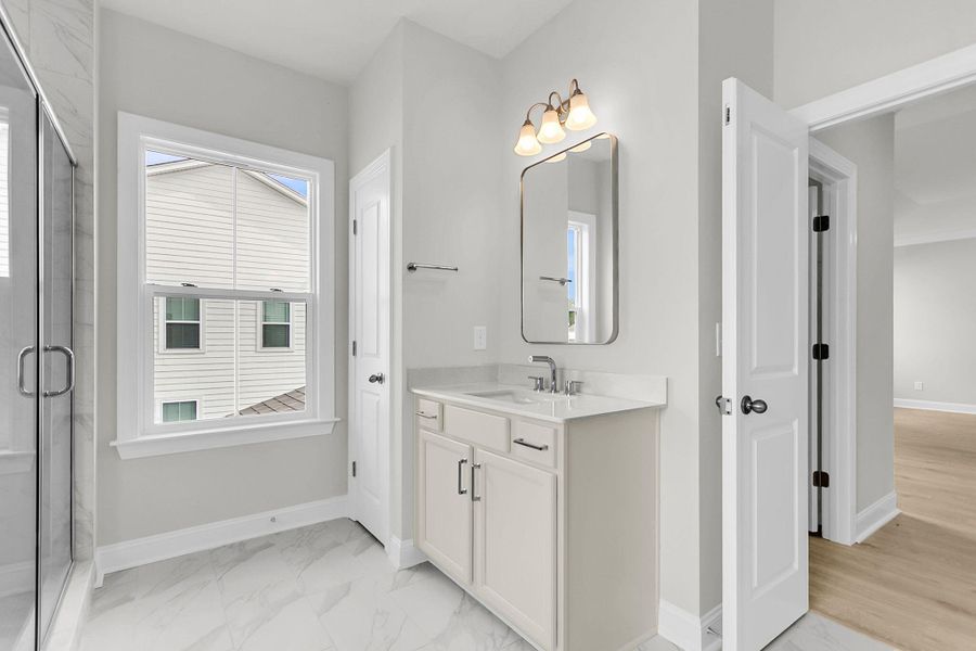 Furnished interior view inside a new home in Tidewater at Lakes of Cane Bay, Summerville (Image 26).