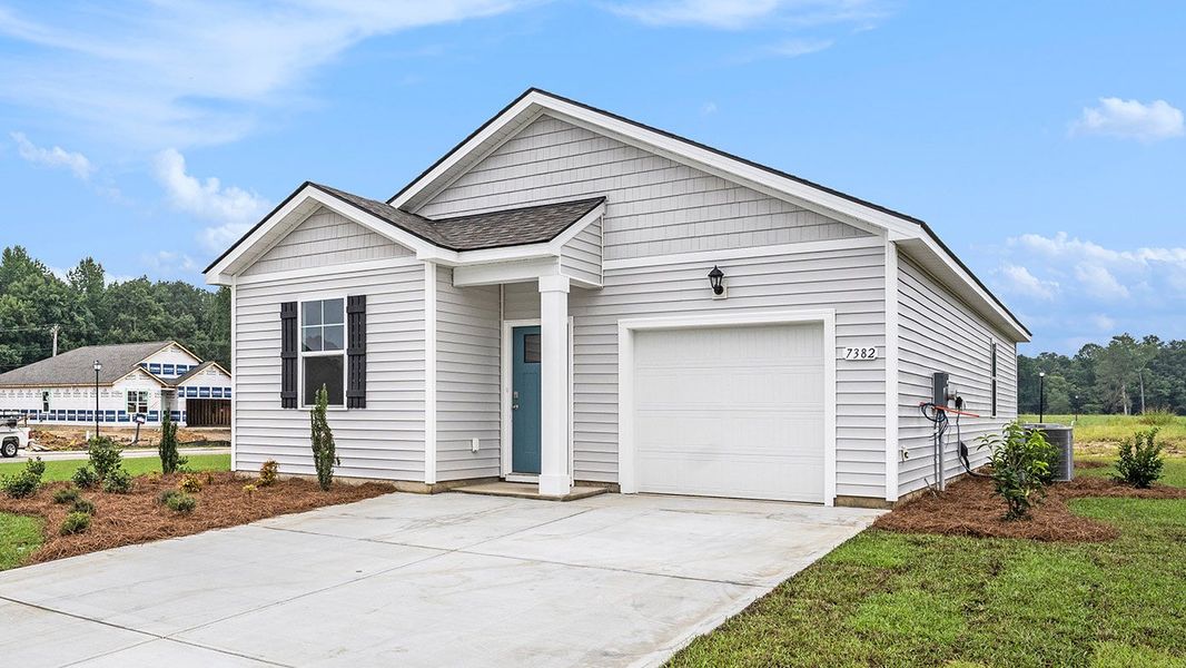 Front exterior of a new home in The Bluffs at Mill Creek, Florence, SC, highlighting curb appeal (Image 23).