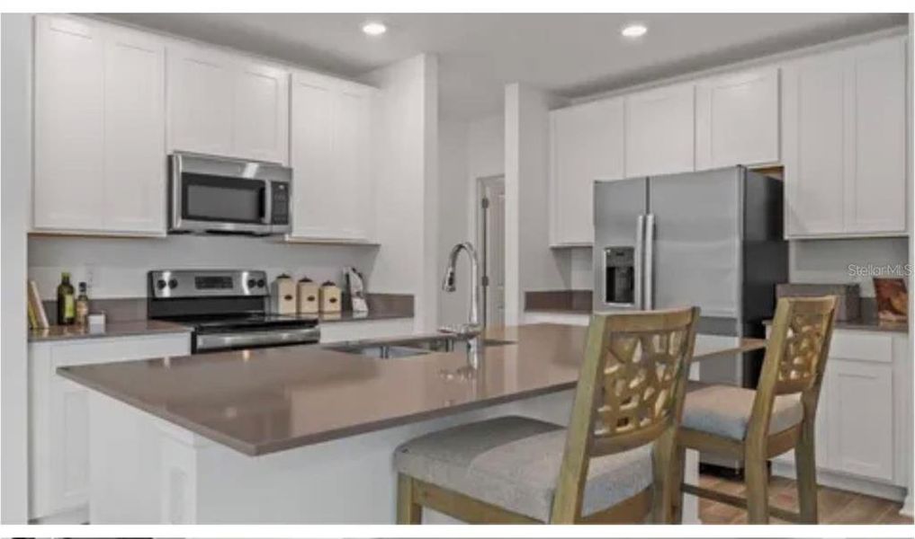 Furnished interior view inside a new home in Cascades: Legacy Collection, Davenport (Image 5).