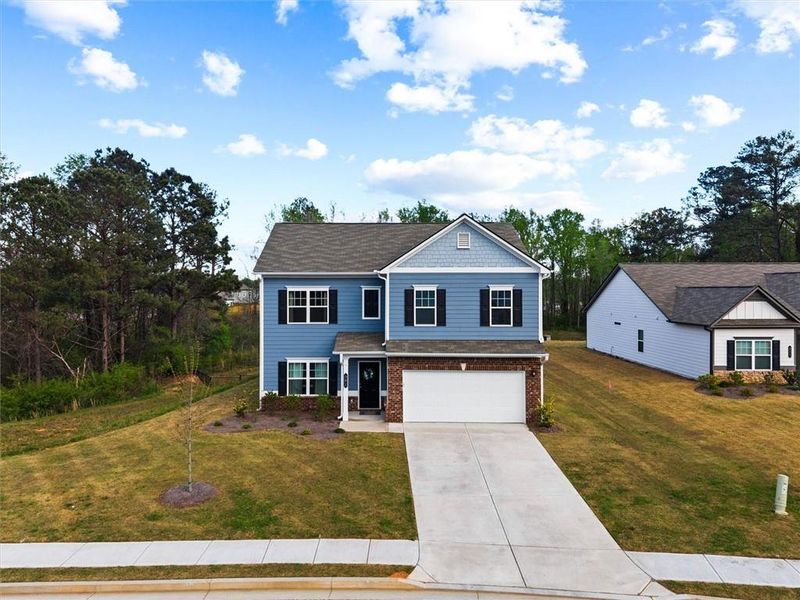Front exterior of a new home in Garrett Preserve, Hiram, GA, highlighting curb appeal (Image 29).