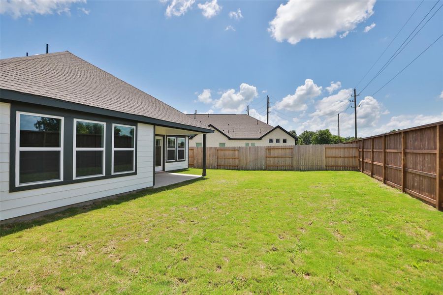 Front exterior of a new home in Oakwood Estates, Waller, TX, highlighting curb appeal (Image 1). Front exterior of a new home in Oakwood Estates, Waller, TX, highlighting curb appeal (Image 1).