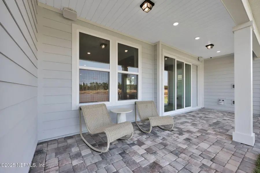 Exterior details and patio area of a home in Del Webb Wildlight, Yulee (Image 2). Exterior details and patio area of a home in Del Webb Wildlight, Yulee (Image 2).