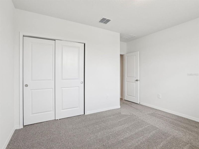 Spacious, unfurnished interior of a new home in The Reserve at Van Oaks, Auburndale (Image 18).
