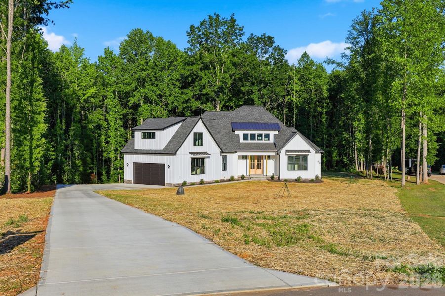 Front exterior of a new home in , Clover, SC, highlighting curb appeal (Image 1). Front exterior of a new home in , Clover, SC, highlighting curb appeal (Image 1).