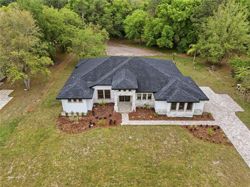 Front exterior of a new home in , Kissimmee, FL, highlighting curb appeal (Image 27).