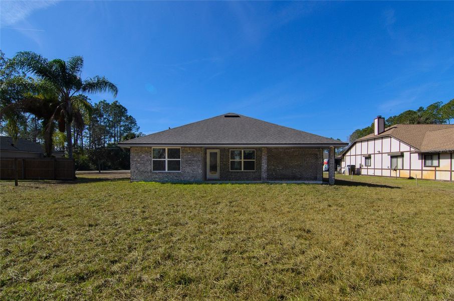 Exterior details and patio area of a home in Palm Coast, Palm Coast (Image 3).