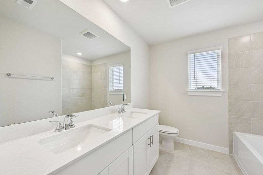 Furnished interior view inside a new home in Landing Meadows - Traditional Series, New Caney (Image 15).