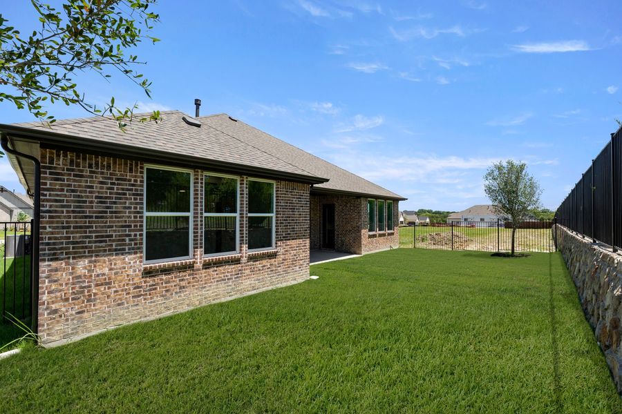 Exterior details and patio area of a home in Nelson Lake Estates, Rockwall (Image 3). Exterior details and patio area of a home in Nelson Lake Estates, Rockwall (Image 3).