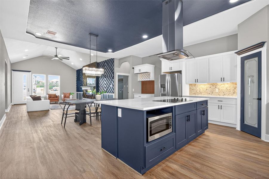 Kitchen offers generous workspace, custom cabinetry, and convenient access to the dining area. Kitchen offers generous workspace, custom cabinetry, and convenient access to the dining area.