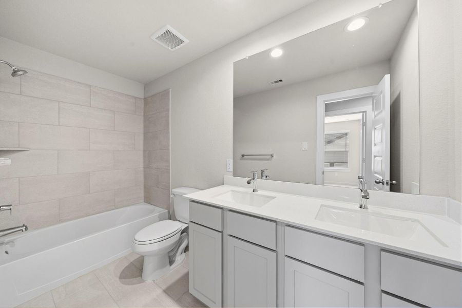 Furnished interior view inside a new home in Barton Creek Ranch, Conroe (Image 8).