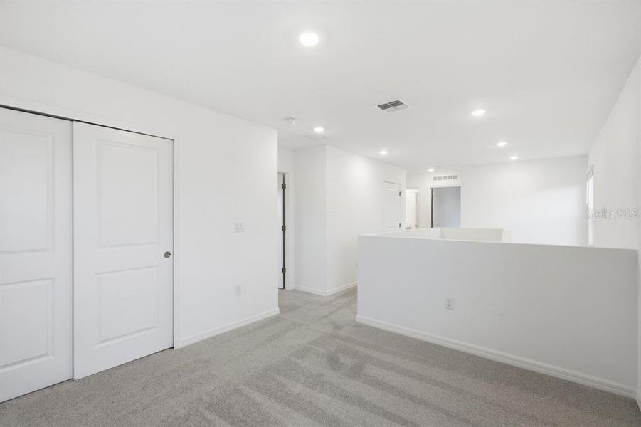 Spacious, unfurnished interior of a new home in Waterstone, Groveland (Image 37).