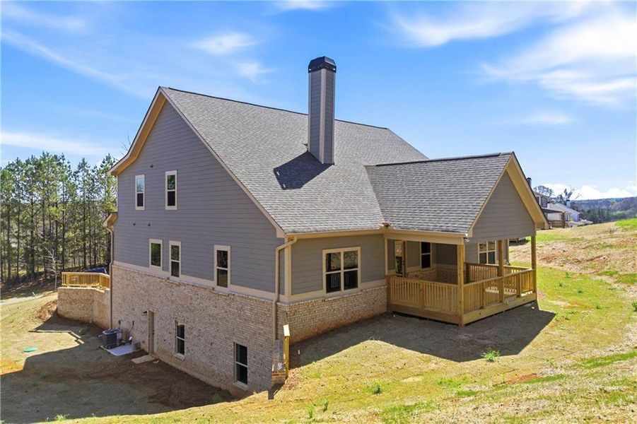 Exterior details and patio area of a home in Steeplechase, Hoschton (Image 19).