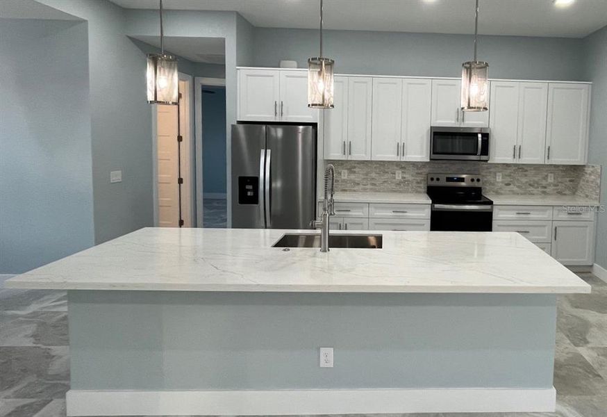 Furnished interior view inside a new home in , Port Charlotte (Image 11).