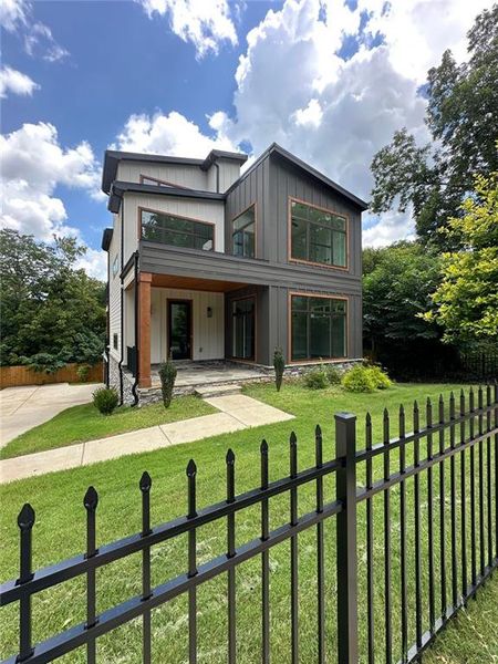 Front exterior of a new home in , Atlanta, GA, highlighting curb appeal (Image 26). Front exterior of a new home in , Atlanta, GA, highlighting curb appeal (Image 26).