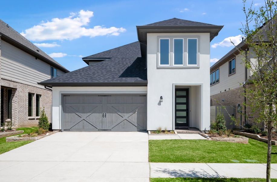 Representative exterior photo of a completed home built from the Newport by Taylor Morrison in The Retreat at Harvest, Argyle, TX (Image 20).