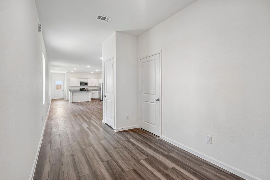 Representative unfurnished interior of a home built from the The Enterprise by Starlight Homes in Windmill Farms, Forney (Image 18).