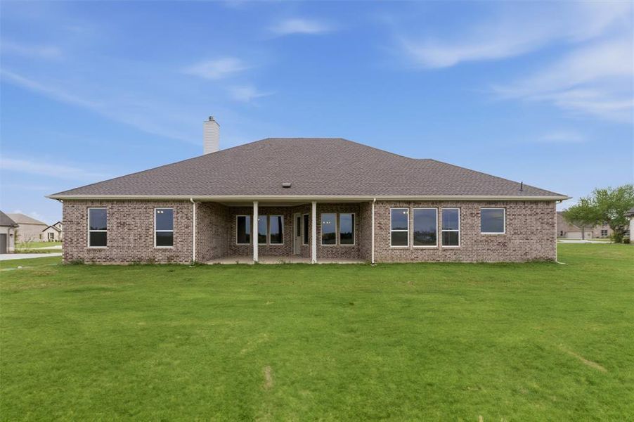 Exterior details and patio area of a home in Fannin Ranch, Leonard (Image 19).