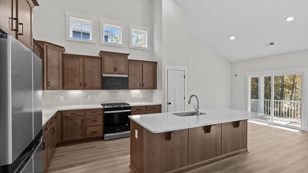 Accomplished layout with a first-class kitchen in this select community by DRB Homes Accomplished layout with a first-class kitchen in this select community by DRB Homes