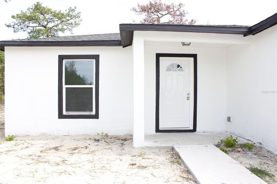 Exterior details and patio area of a home in , Spring Hill (Image 3).