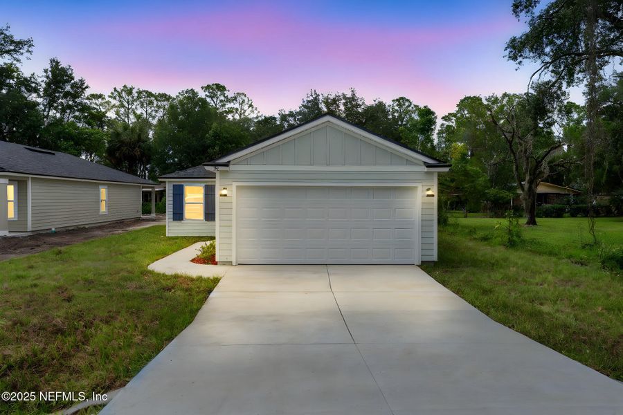 Front exterior of a new home in , Green Cove Springs, FL, highlighting curb appeal (Image 26).