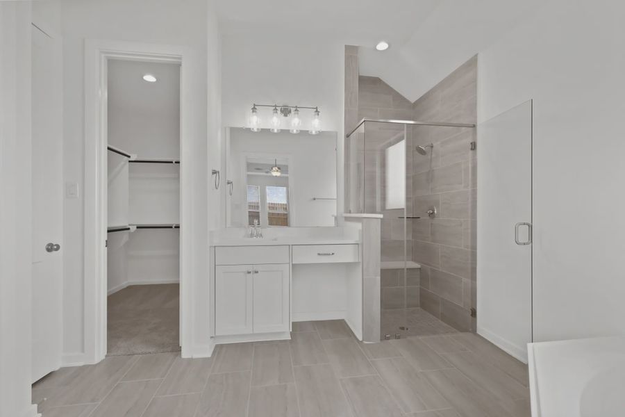 Representative furnished interior of a home built from the Payton by Chesmar Homes in The Highlands, Porter (Image 6).