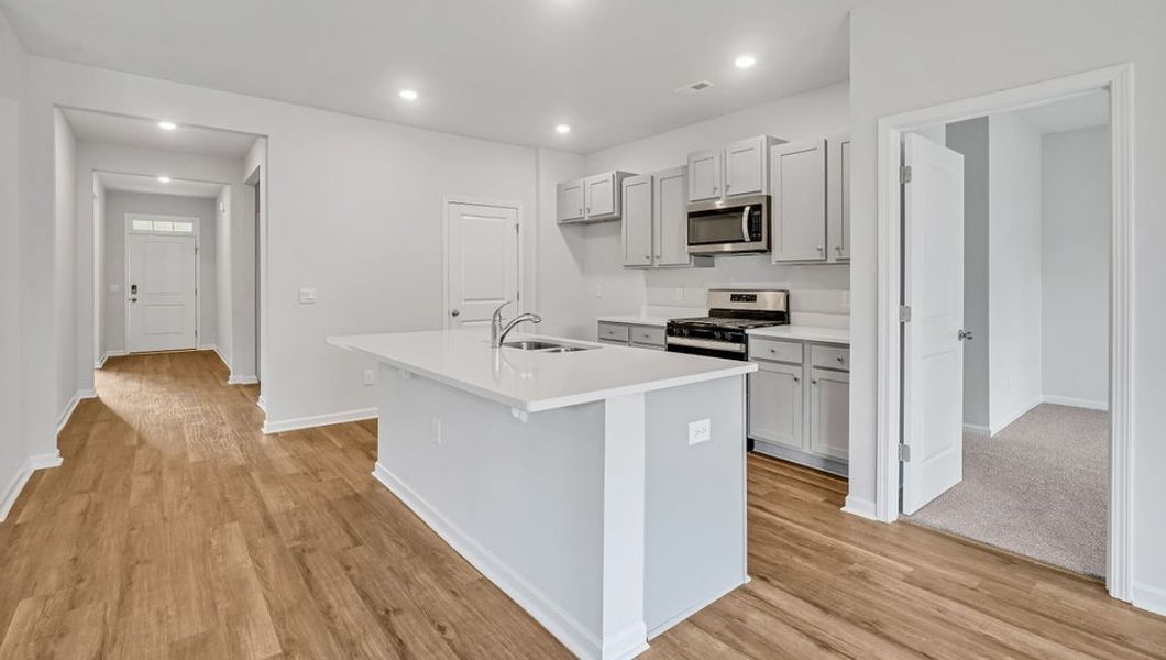 Representative furnished interior of a home built from the ARIA by D.R. Horton in Bella Point, Bolivia (Image 10).