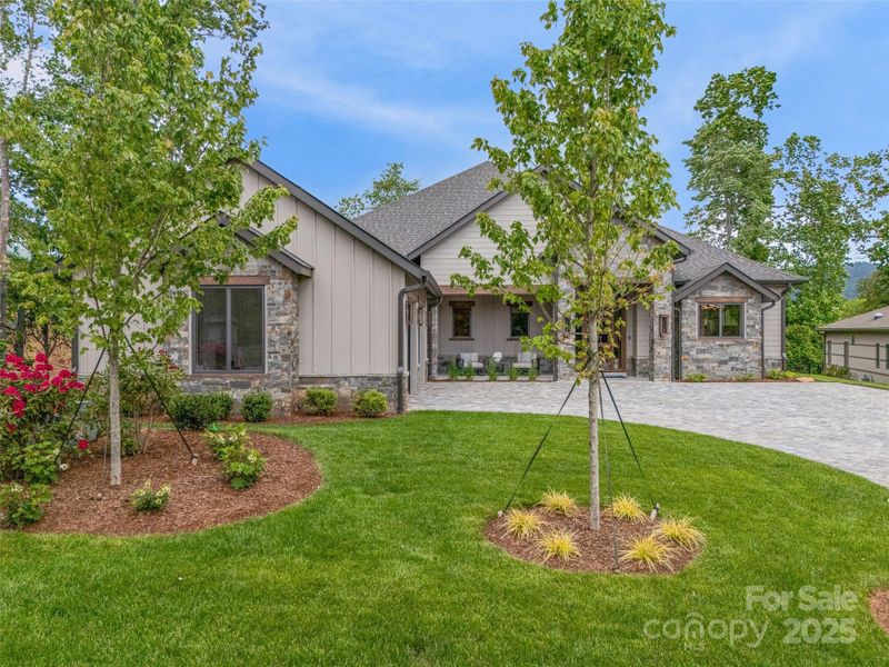 Front exterior of a new home in , Arden, NC, highlighting curb appeal (Image 19). Front exterior of a new home in , Arden, NC, highlighting curb appeal (Image 19).