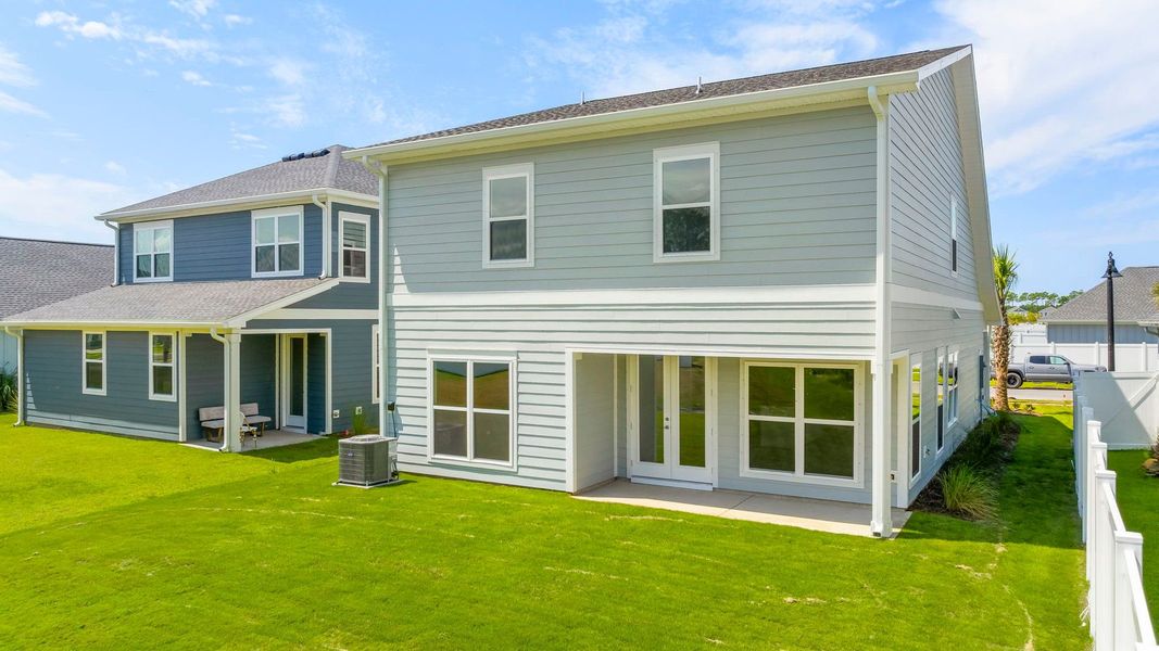 Exterior details and patio area of a home in Breakfast Point East Phase I, Panama City Beach (Image 22).