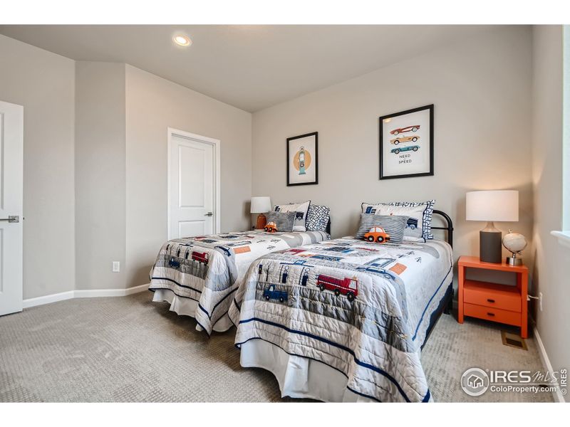 Fourth bedroom *Photo not of actual home, but same floorplan and style/colors*