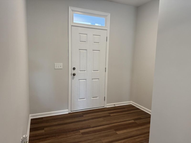 Spacious, unfurnished interior of a new home in East Main Townes, Spartanburg (Image 9).