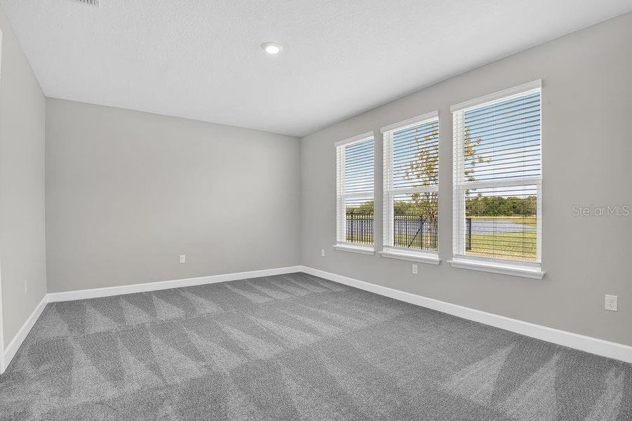 Spacious, unfurnished interior of a new home in Colbert Landings, Palm Coast (Image 22).