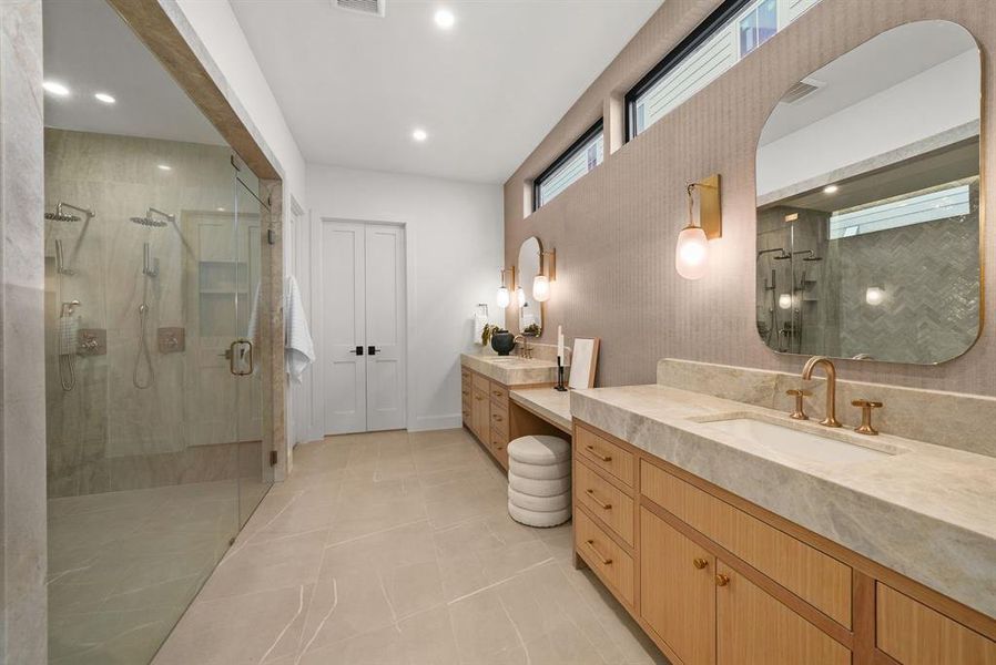 Full bath with a stall shower, two vanities, light tile patterned flooring, and recessed lighting Full bath with a stall shower, two vanities, light tile patterned flooring, and recessed lighting