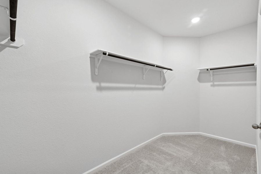 The Sparrow II- Primary Suite Closet. Sample floor plan image for illustration; upgrades, options, and colors may vary. The Sparrow II- Primary Suite Closet. Sample floor plan image for illustration; upgrades, options, and colors may vary.