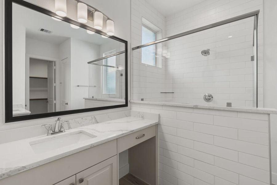 Representative furnished interior of a home built from the Macalister by Chesmar Homes in Artavia, Conroe (Image 7).