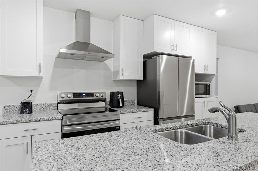 Furnished interior view inside a new home in Reunion, Commerce City (Image 3).