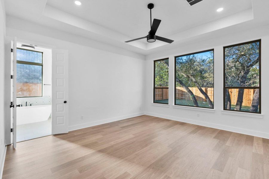 Primary Bedroom with tray ceiling