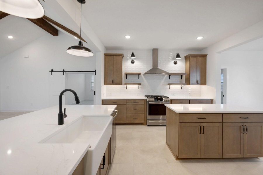 Gourmet kitchen with dual islands