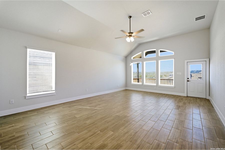 Spacious, unfurnished interior of a new home in The Woodlands at Medina Hills, Mico (Image 31).