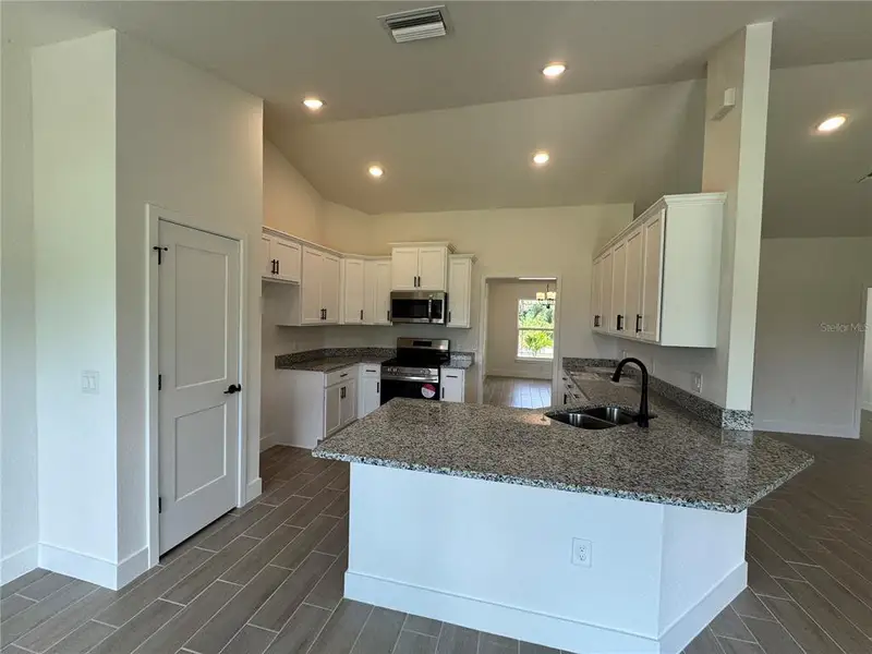 Furnished interior view inside a new home in North Port, North Port (Image 6).