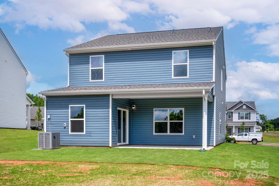 Front exterior of a new home in Ascot Woods, Charlotte, NC, highlighting curb appeal (Image 2).