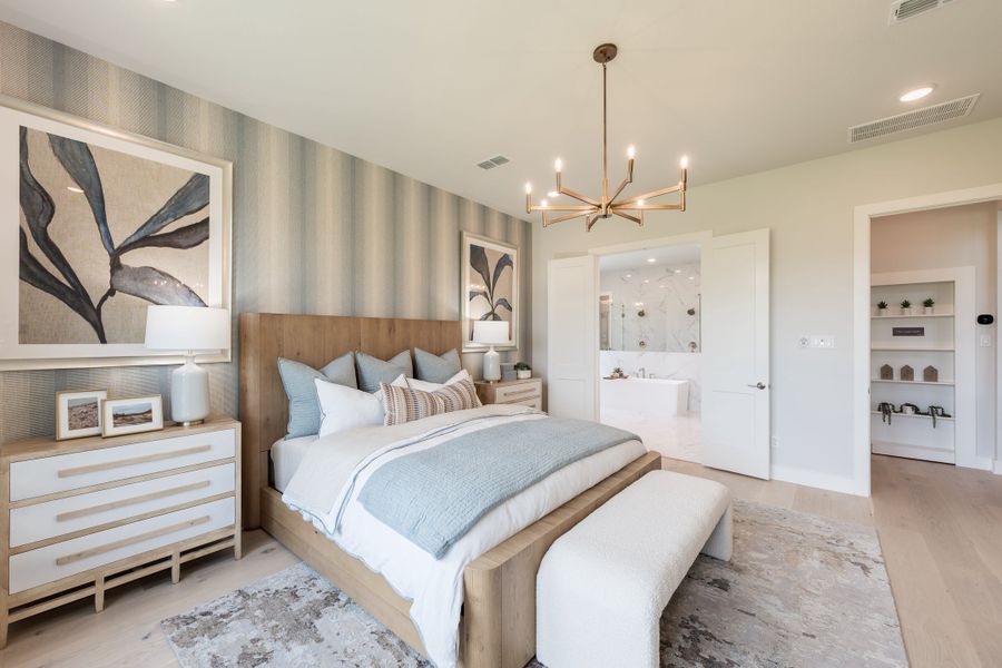 Representative furnished interior of a home built from the Woodbridge by Tri Pointe Homes in Bridgeland, Cypress (Image 27).