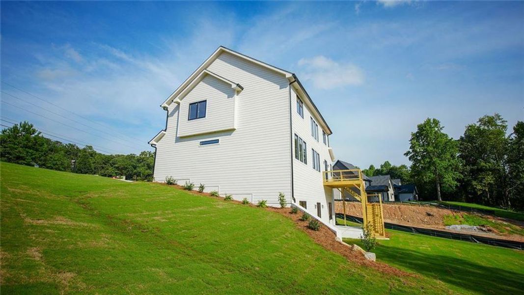Exterior details and patio area of a home in , Flowery Branch (Image 34).