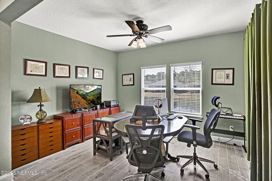 Furnished interior view inside a new home in Tributary: Lakeview at Tributary 60's, Yulee (Image 8).