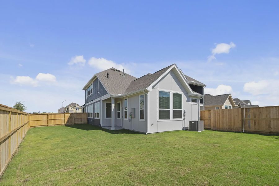 Representative exterior details of a home built from the Versailles by Chesmar Homes in Meridiana Chateau, Manvel (Image 33).