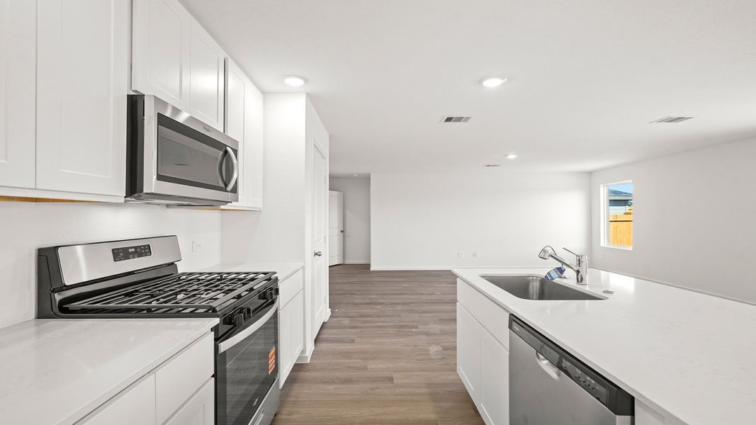 Furnished interior view inside a new home in Westward Pointe, Sealy (Image 7).